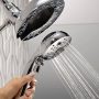 Illustration of a showerhead making a squealing noise with water droplets, highlighting plumbing issues and maintenance tips