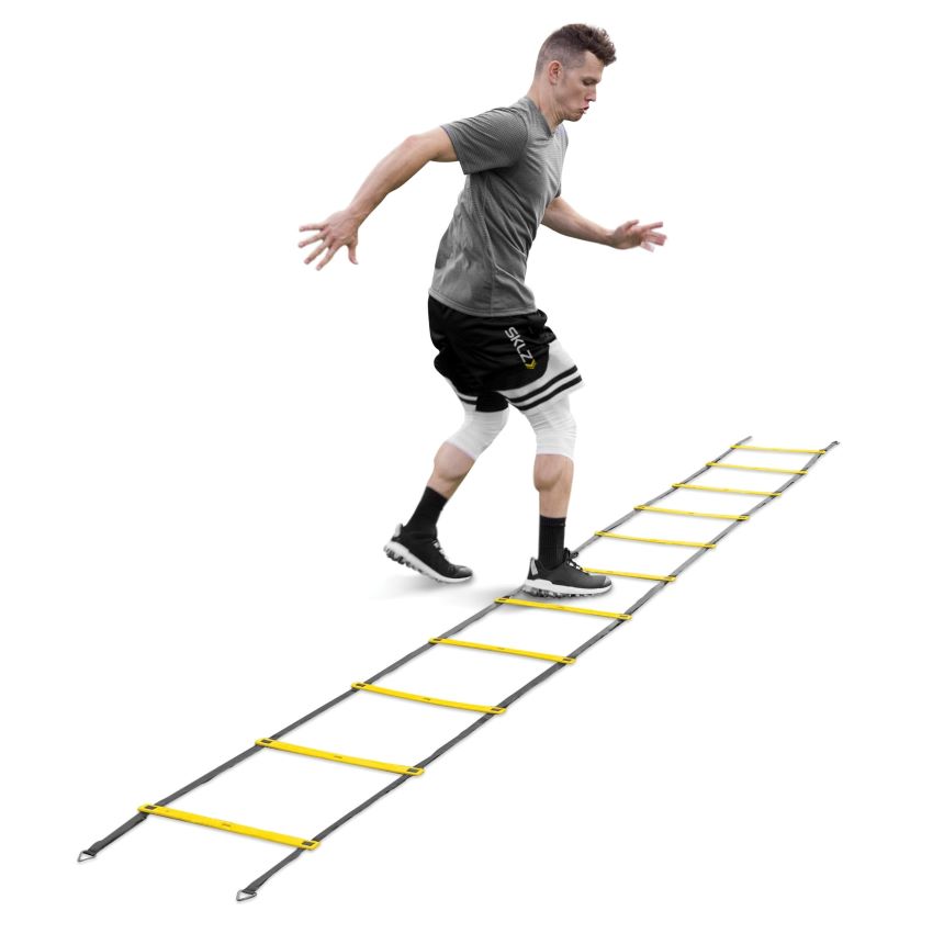 Athlete improving speed and coordination with SKLZ agility ladder.
