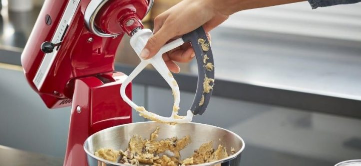 KitchenAid KFE5T Flex Edge Beater attached to a stand mixer, ideal for efficient home baking.