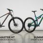 Two entry level mountain bikes standing side by side in a studio.