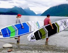 Budget inflatable paddle board floating steadily on calm water
