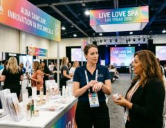 Spa professional exploring new skincare brands at Live Love Spa Las Vegas 2026