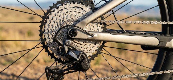 Mountain bike drivetrain inspection on rocky trail