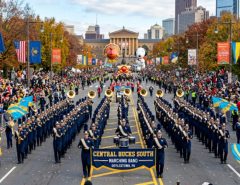 Marching band performing on Benjamin Franklin Parkway during the Philadelphia Thanksgiving parade