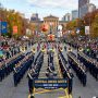 Marching band performing on Benjamin Franklin Parkway during the Philadelphia Thanksgiving parade