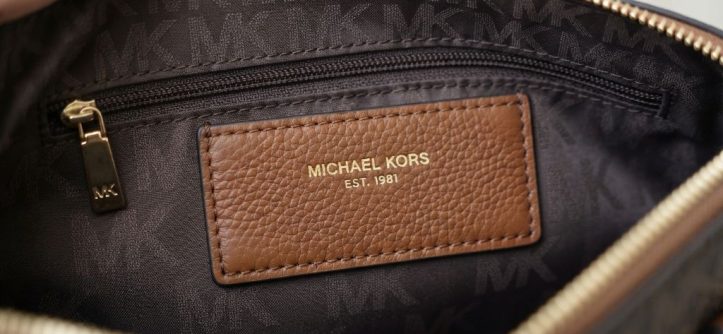 Checking Michael Kors purse logo and hardware