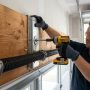 Master garage door opener installation with expert tips on header bracket placement, correct height alignment, and secure mounting for reliable performance.