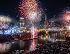 Fireworks exploding over the Cumberland River during Nashville's New Year's Eve Big Bash celebration at midnight