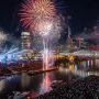 Fireworks exploding over the Cumberland River during Nashville's New Year's Eve Big Bash celebration at midnight